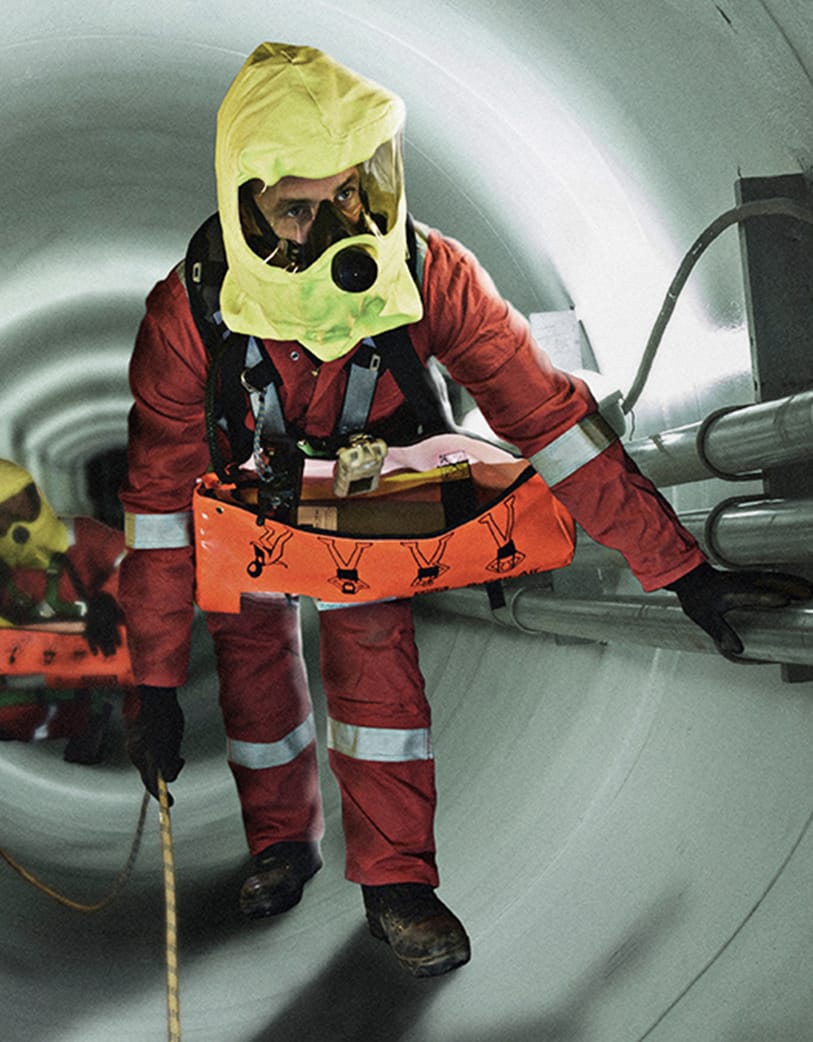 Safety Technician Walking Through Confined Space