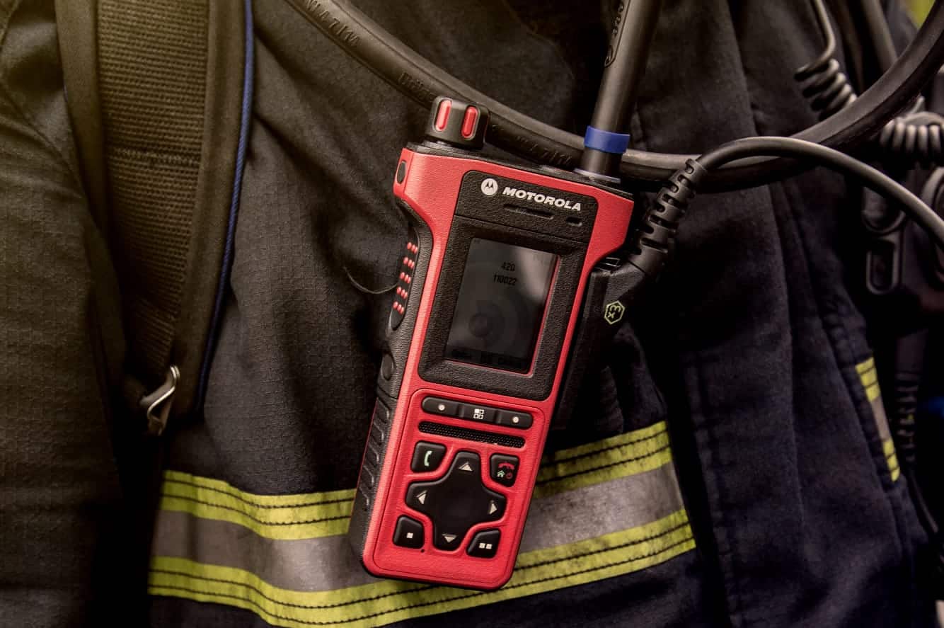 Safetek Two-Way Radio Communication Technology Device Strapped on Worker's Uniform